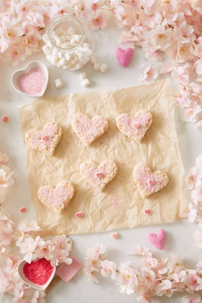 valentine rice krispie treats on a sheet of brown parchment paper