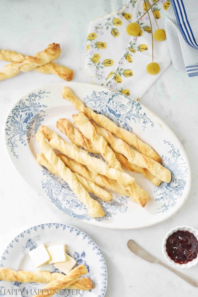 homemade breadsticks without yeast on a blue french platter