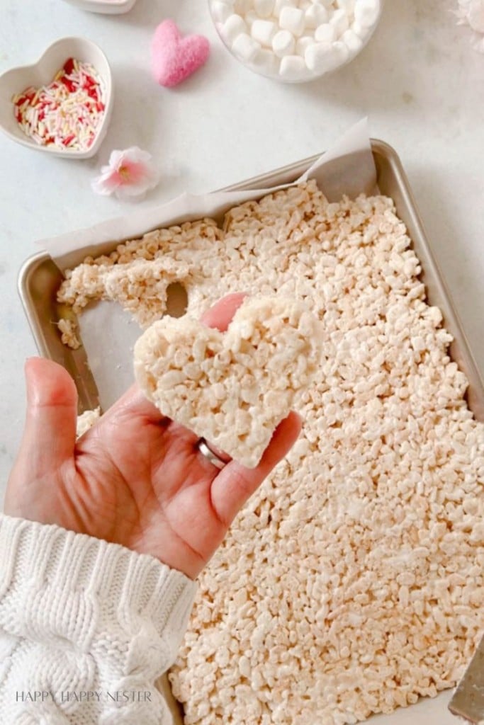 a close up of a cut out heart shaped rice krispie treat