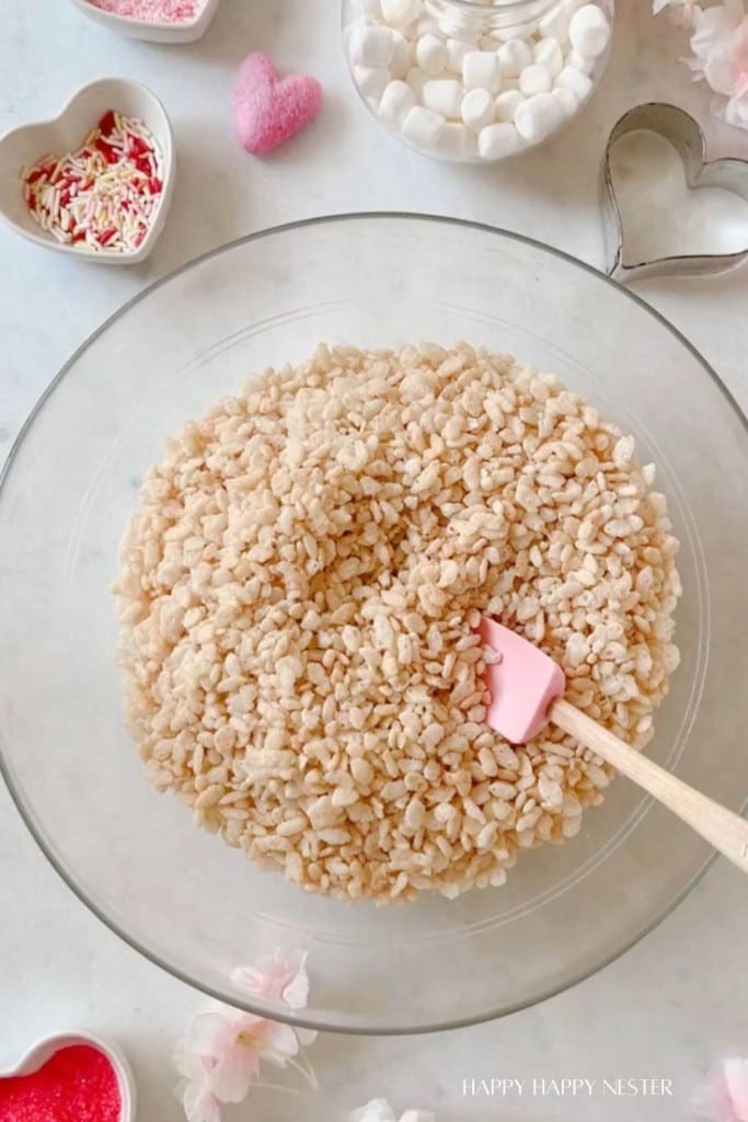 a bowl of rice krispies ready to make some valentine's day treats