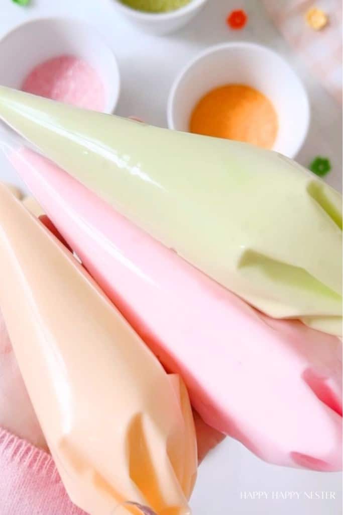 Icing in pastry bags with colored icing