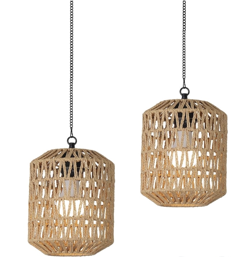 Two hanging pendant lights with woven rattan shades and black chains, each encasing a single light bulb, offer simple porch decor perfect for adding warmth and style—available now on Amazon. Displayed against a white background.
