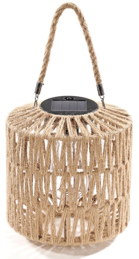 A cylindrical solar lantern with a braided jute rope frame and handle, featuring a black solar panel on top. Its natural, woven design offers amazon unique solar garden decor for a rustic, bohemian appearance.
