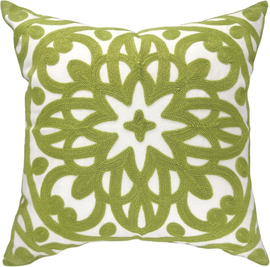 Square decorative pillow with a white background and an intricate green embroidered floral and scroll pattern covering the surface. This bold, symmetrical design adds a touch of elegance, perfect for refreshing your space with springtime throw pillows.