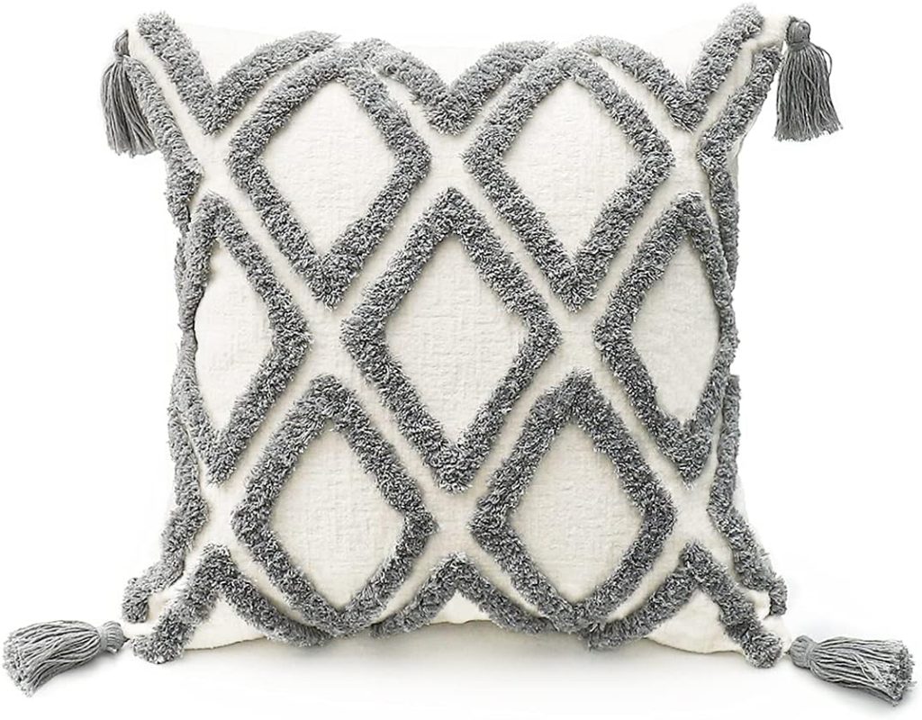 Square throw pillow with a white background, featuring a raised, textured gray diamond pattern and gray tassels on each corner—perfect for adding amazon boho throw pillows style to your space.