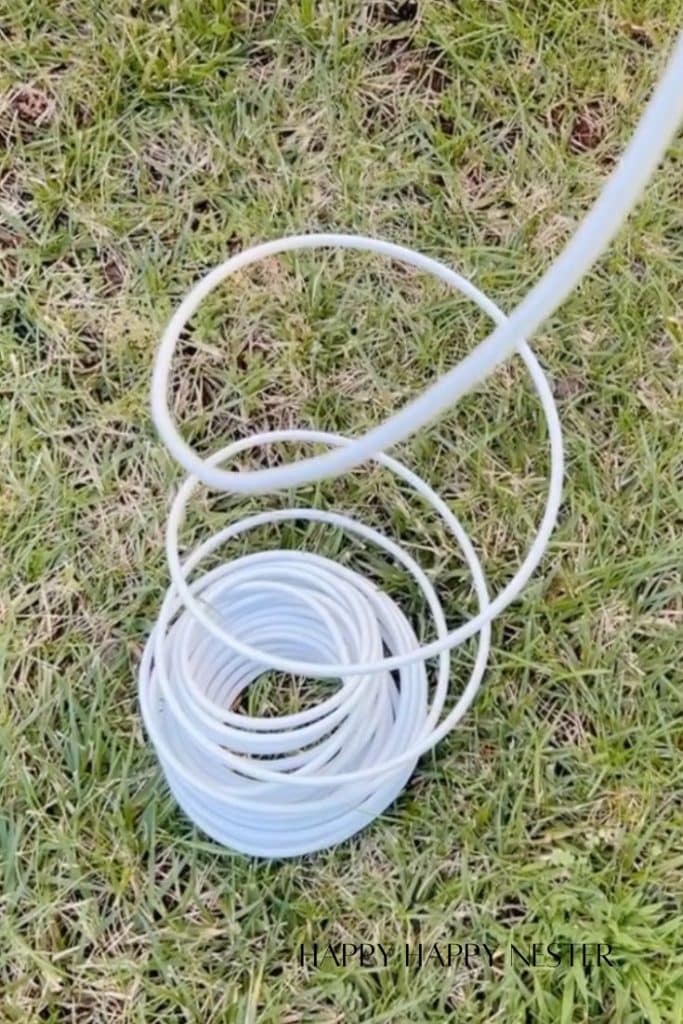 a bunch of white irrigation tubing