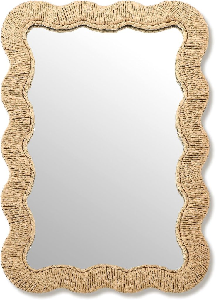 A rectangular mirror with a wavy, natural rattan or straw frame adds textured, handcrafted charm—perfect for those seeking unique rattan decor ideas. This simple yet decorative mirror softly reflects light and enriches any space.