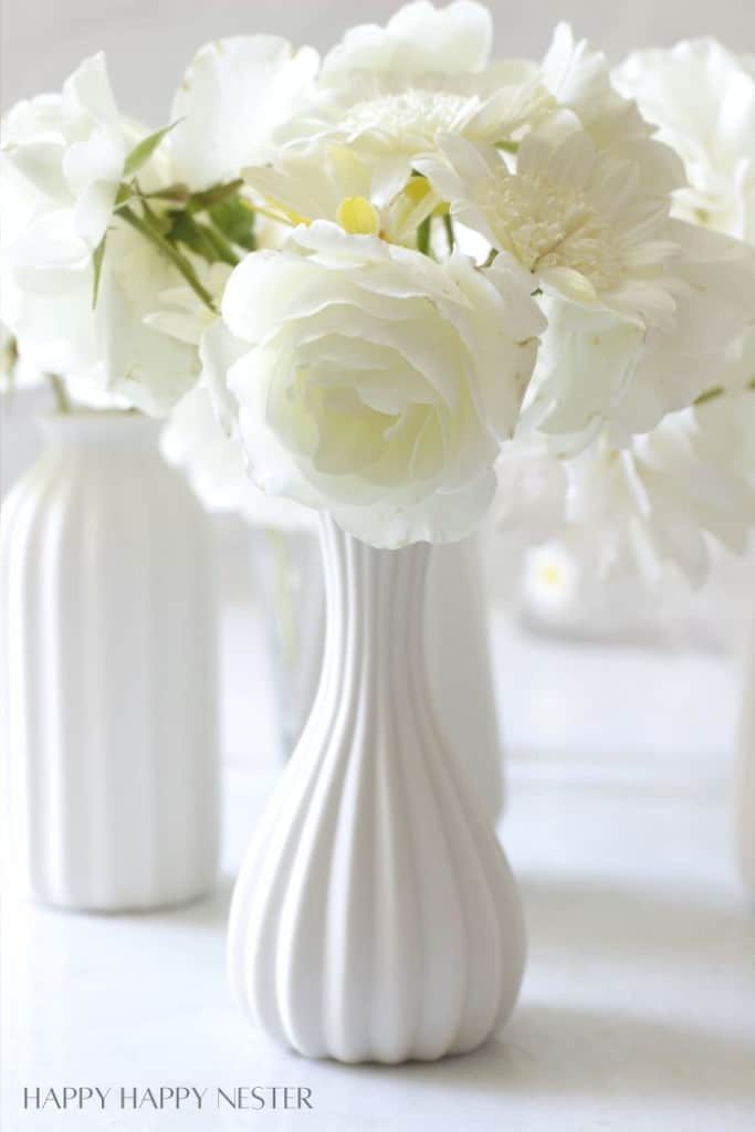 White vase with a small white bouquet