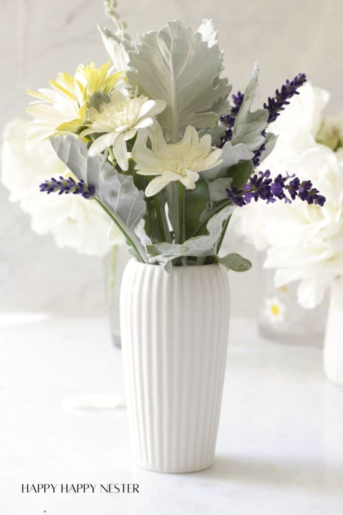 a simple flower arrangement in a short vase
