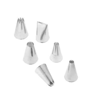 Six metal piping tips arranged on a white background. The tips vary in design, including star, round, and petal shapes. Each tip has a unique opening pattern to create different decorative effects when icing cakes or pastries.