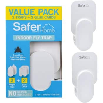 Image showing a "Safer Brand Home Indoor Fly Trap" value pack. The packaging is blue and white and advertises '2 traps + 2 glue cards.' Two fly trap devices are visible on the right with the brand’s logo on them. The traps are said to work without chemical insecticides.