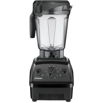 A black Vitamix blender featuring a large clear blending jar with a lid and handle, positioned on a solid base with control dials and switches for various blending settings. The design is sleek and modern, ideal for kitchen use.