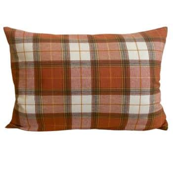 A rectangular pillow with a plaid pattern featuring shades of brown, red, white, and beige. The pillow has a soft texture and is slightly bulging at the sides, suggesting a fluffy filling. The plaid design is symmetrical with horizontal and vertical lines.