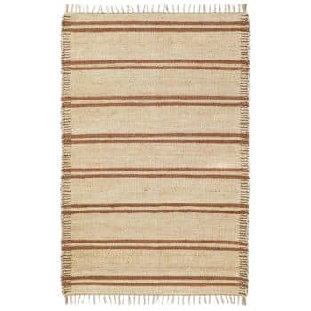 A rectangular woven rug with a natural beige base color. It has five horizontal brown stripes evenly spaced across the rug. The edges feature a fringe detail.