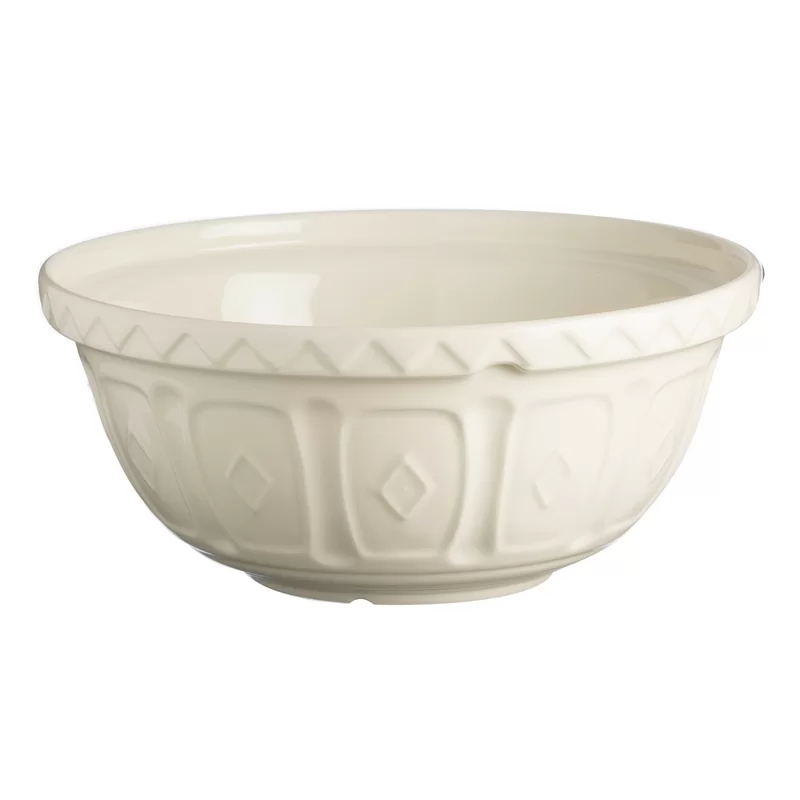 A ceramic mixing bowl featuring a cream-colored exterior with a pattern of diamond and geometric shapes around the sides. The rim is smooth, evoking the classic feel of preparing traditional recipes like Phyllo Crinkle Cake. The interior is plain and glossy, ideal for all your baking needs.