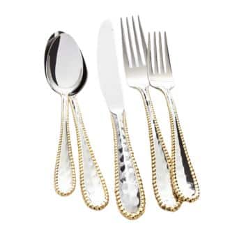 A set of five shiny silver utensils with a textured and golden-beaded design on the handles. The set includes a spoon, a knife, and three forks of varying sizes. The utensils are neatly arranged side by side on a white background.