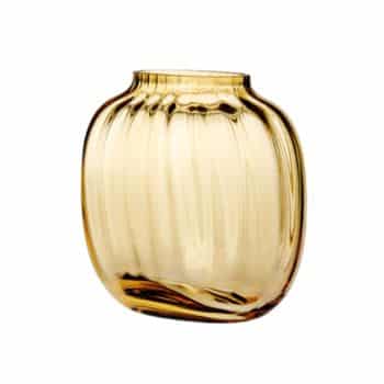 A translucent amber glass vase with a rounded, slightly fluted shape and a narrow opening at the top. The vase has a smooth, glossy surface that reflects light.