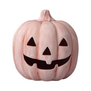 A white ceramic pumpkin with a carved jack-o'-lantern face, featuring triangular eyes, a triangle nose, and a wide, toothy grin. The pumpkin's stem is short and also ceramic.