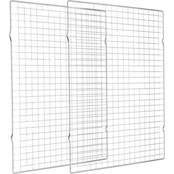 Two transparent graphing sheets, each featuring a grid pattern of evenly spaced lines. The sheets are overlaid, with one slightly offset and behind the other, creating a layered effect reminiscent of the intricate steps in autumn recipes.