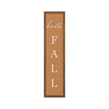 A vertical wooden sign with a brown background features the text "hello FALL" in white lettering. "hello" is in cursive at the top left corner, followed by "FALL" written vertically in capital letters.