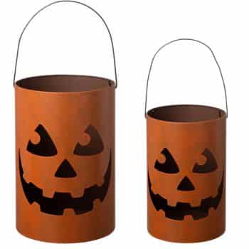 Two cylindrical, orange metal buckets with jack-o'-lantern faces cut out and black wire handles, one larger than the other—perfect as front door decor for fall or festive Halloween decorations.