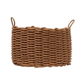 A brown, woven rope basket with two looped handles on each side, featuring a textured pattern. The basket is oval-shaped and sits against a plain white background.