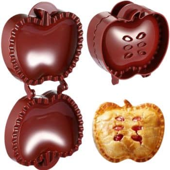 Three apple-shaped pie molds are shown. The first is open, displaying its smooth interior. The second has vent holes for dough shaping, perfect for fall pies and cakes. The third is a baked pie resembling the mold's design, with a golden crust and vent holes.