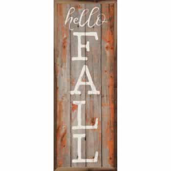 A rustic wooden sign with "hello FALL" makes charming front door decor for fall. "Hello" is in cursive at the top, while "FALL" appears vertically in bold white letters on wood with warm orange and brown tones.