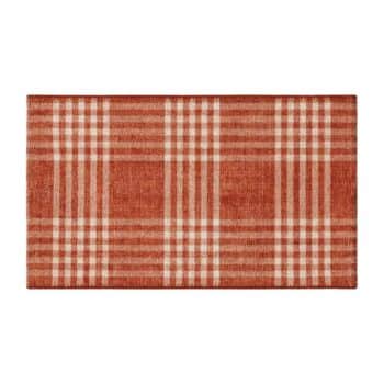 A rectangular doormat features a red and beige plaid pattern. The design includes intersecting vertical and horizontal lines forming a checkered appearance. The colors create a warm and inviting look suitable for use in an entryway or vestibule.