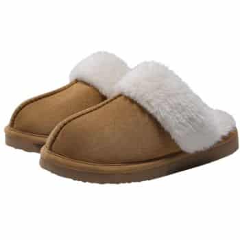 A pair of brown suede slippers with fluffy white lining, designed for comfort and warmth. The slippers have a closed-toe design and a durable sole, displayed against a plain background.