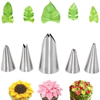 An image of five stainless steel piping tips arranged in a row, serving as cake inspiration. Above them, green frosting leaves flourish, while below, three cupcakes showcase stunning designs: a sunflower, pink petals, and a rose pattern.