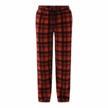 Red and black plaid pajama pants against a white background.