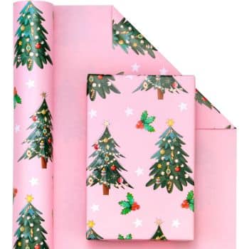 Pink wrapping paper and a wrapped gift featuring Christmas tree designs, holly, and stars.