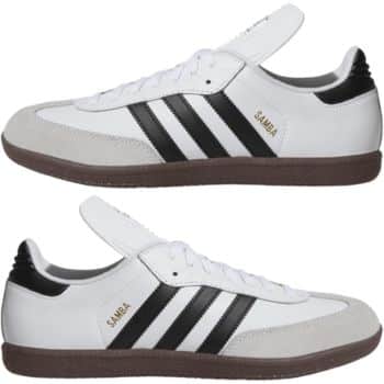 A pair of white Adidas Samba sneakers with black stripes and a brown sole. The shoes have "SAMBA" written in gold on the side near the heel.