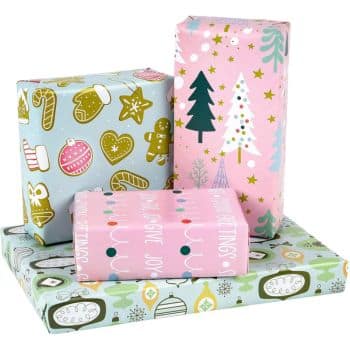 Four wrapped gifts with festive patterns and cute Christmas tags. The packages showcase designs of trees, gingerbread cookies, and ornaments in pink, green, and blue hues.