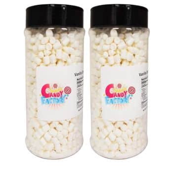 Two clear plastic jars with black lids filled with small white marshmallows. The label reads "Vanilla" and features colorful "Candy Factory" branding with whimsical designs.