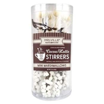 A clear cylindrical container holds Melville cocoa/latte stirrers with mini marshmallows. The label indicates they're chocolate dipped and naturally and artificially flavored.