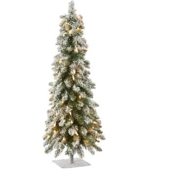 A tall, slender artificial Christmas tree with snow-covered branches and glowing lights, standing on a white base.