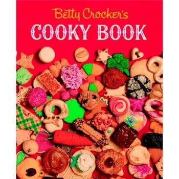 Cover of "Betty Crocker's Cooky Book" featuring an array of colorful Christmas treat recipes in various shapes and decorations against a bright red background. The title is prominently displayed at the top in white text.