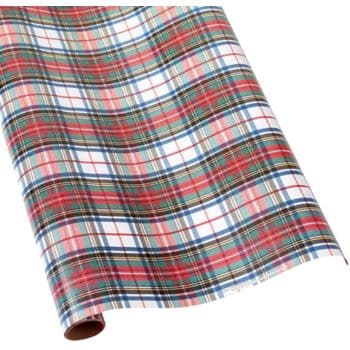 A roll of plaid wrapping paper with a red, green, blue, and white checkered pattern on a white background lies partially unrolled to reveal the design. Pair it with cute Christmas tags for a charming gift presentation.