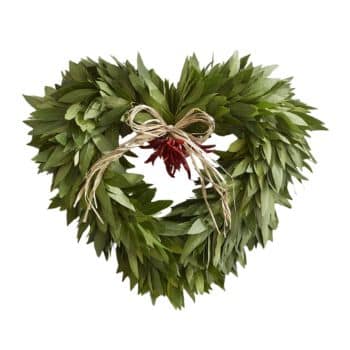 Heart-shaped wreath made of green leaves with a bow at the top center.