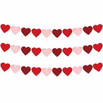 Three rows of heart-shaped paper garlands in alternating red and pink colors are evenly spaced across a white background.