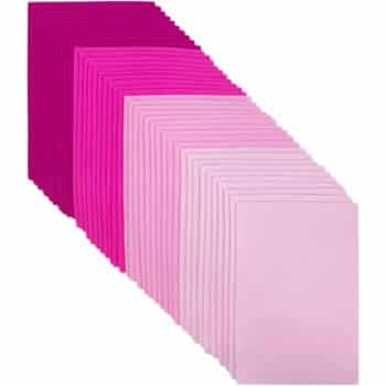 A collection of rectangular felt sheets in various shades of pink, perfect for pink crafts. The hues range from deep magenta to pastel, with the sheets aligned in rows to create a gradient effect from dark to light pink.