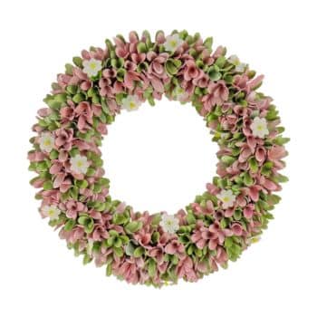 A round floral wreath decorated with pink and green flowers, interspersed with small white blossoms. The arrangement forms a full circle, showcasing a balanced and colorful design against a plain white background.