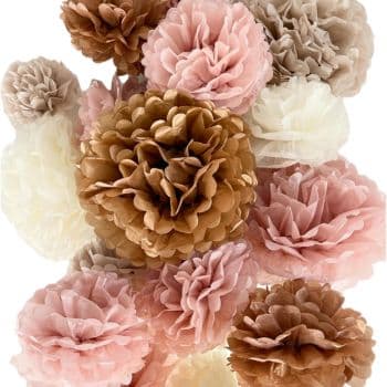 A collection of decorative paper flowers in shades of brown, pink, and cream, arranged closely together. This easy flower paper craft features blooms with a layered, ruffled appearance, resembling peonies or dahlias.