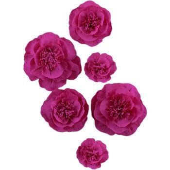 Seven vibrant pink flowers of varying sizes are scattered against a white background, reminiscent of easy flower paper crafts. The flowers have intricate petals, adding a textured appearance to each bloom.