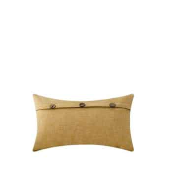 A rectangular mustard-colored throw pillow with three large brown buttons along the top edge, placed against a plain white background.