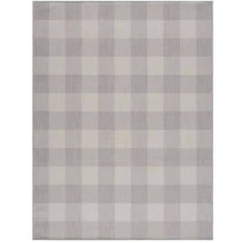 A rectangular rug with a checkered pattern in shades of gray and white. The design consists of evenly spaced squares creating a subtle, repetitive grid effect throughout the entire rug.