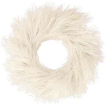 A circular wreath made of soft, fluffy white pampas grass with feathery textures, arranged in a spiral pattern.