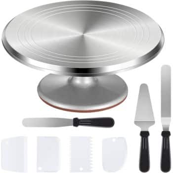 A metal cake turntable with a rotating base is perfect for showcasing your best spring cakes. It comes with three spatulas featuring black handles and four plastic cake scrapers of various shapes and serrated designs.